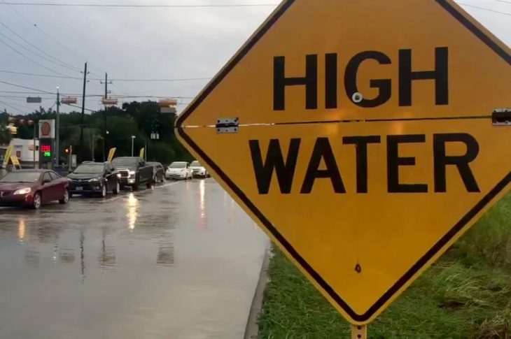 photograph of roads with high water following severe storm started