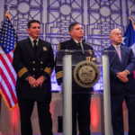 Mayor Whitmire stands with newly appointed Chiefs of Fire and Police.