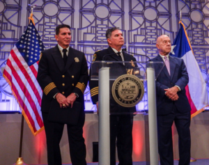 Mayor Whitmire stands with newly appointed Chiefs of Fire and Police.